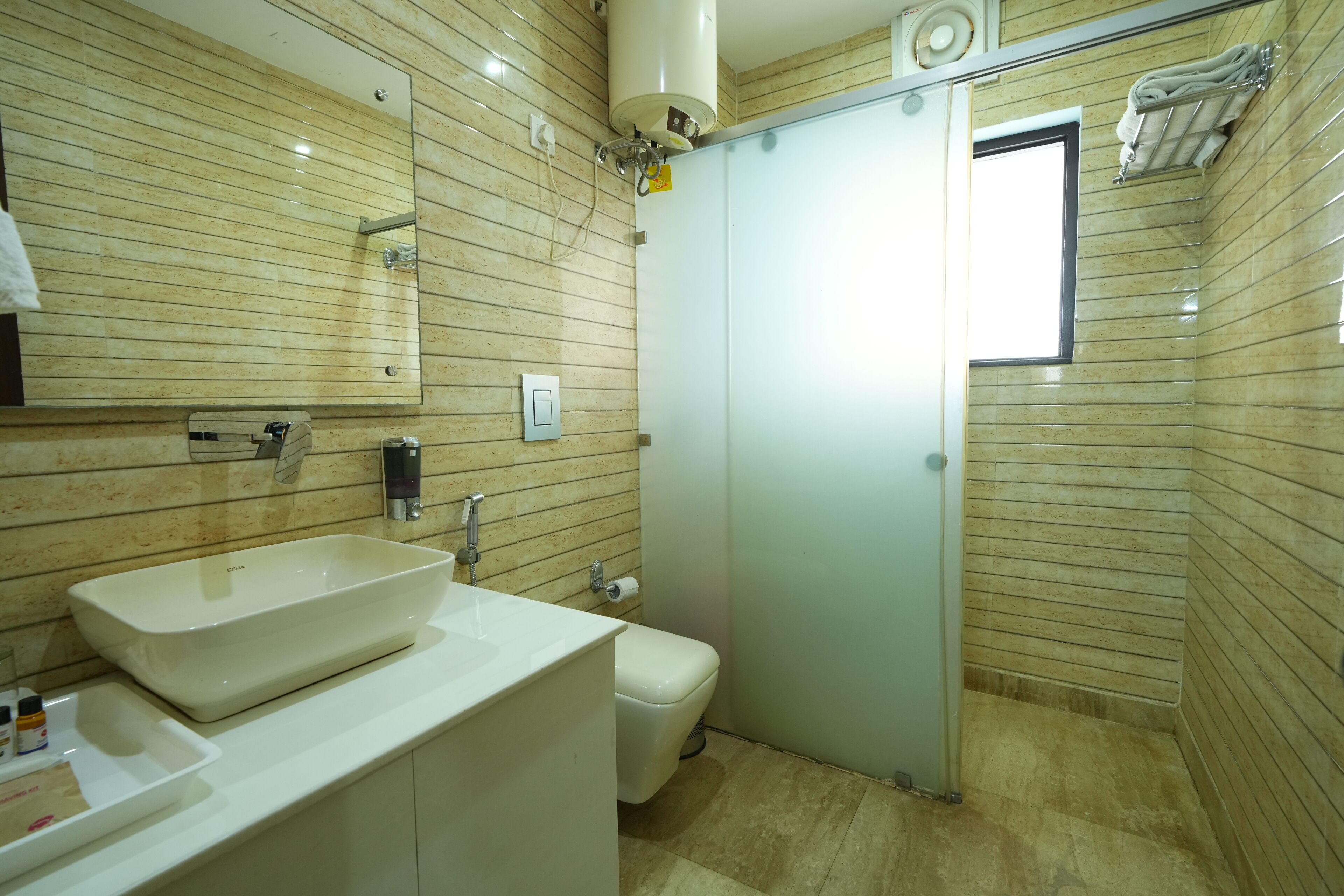 Premium-værelse | Badeværelse | Bruser, designertoiletartikler, hårtørrer, Sæbe