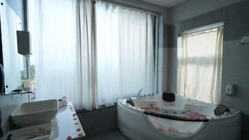 Shower, designer toiletries, hair dryer, soap