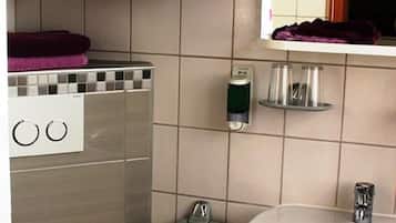 Quadruple Room, Multiple Beds, Non Smoking | Bathroom | Shower, hair dryer, towels