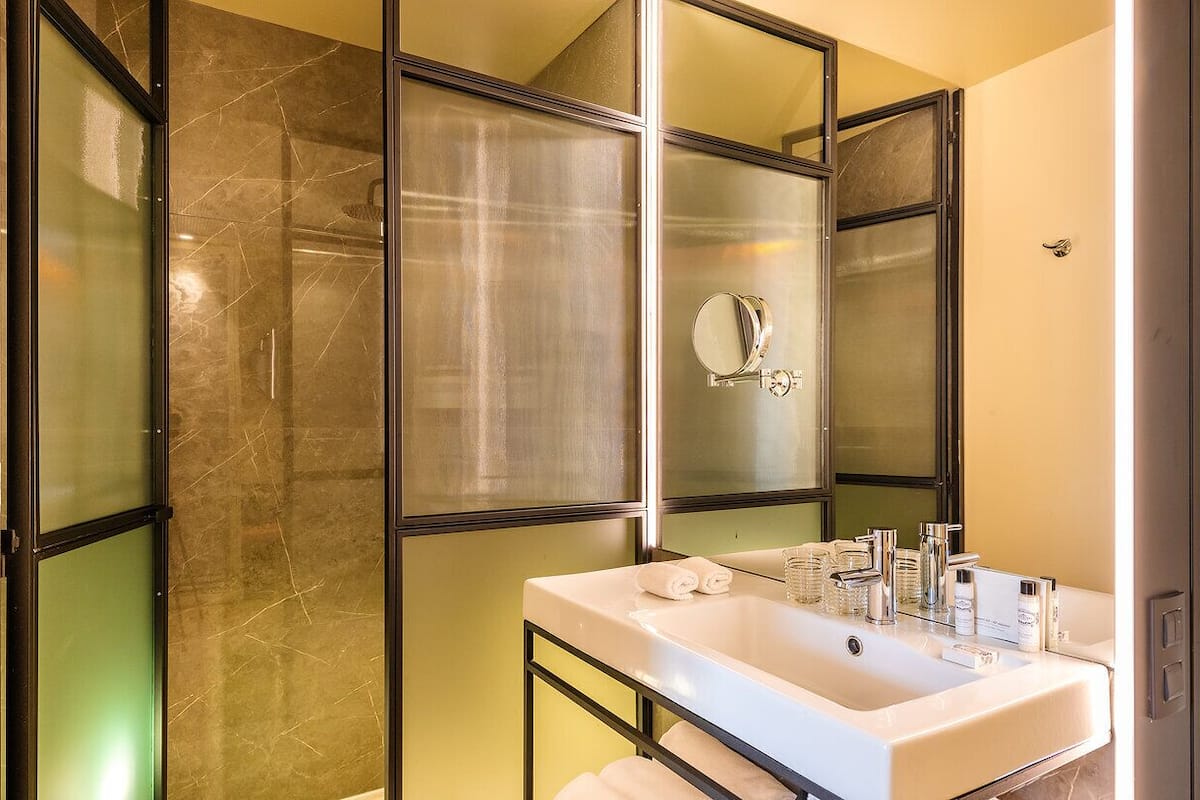 superior room (plaza mayor) | bathroom | designer toiletries, hair dryer, bathrobes, slippers