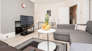 Comfort Apartment, 2 Bedrooms, City View | Living area | Flat-screen TV