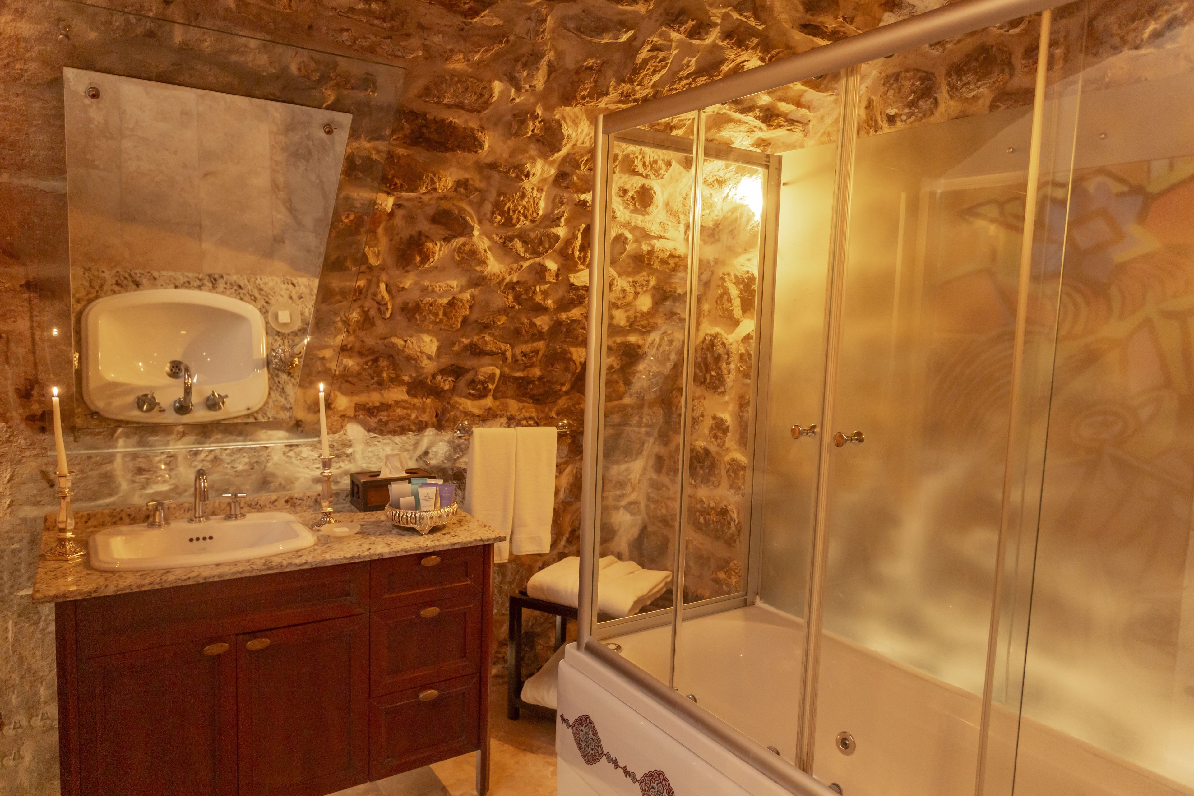 superior room | bathroom | designer toiletries, hair dryer, bathrobes, slippers