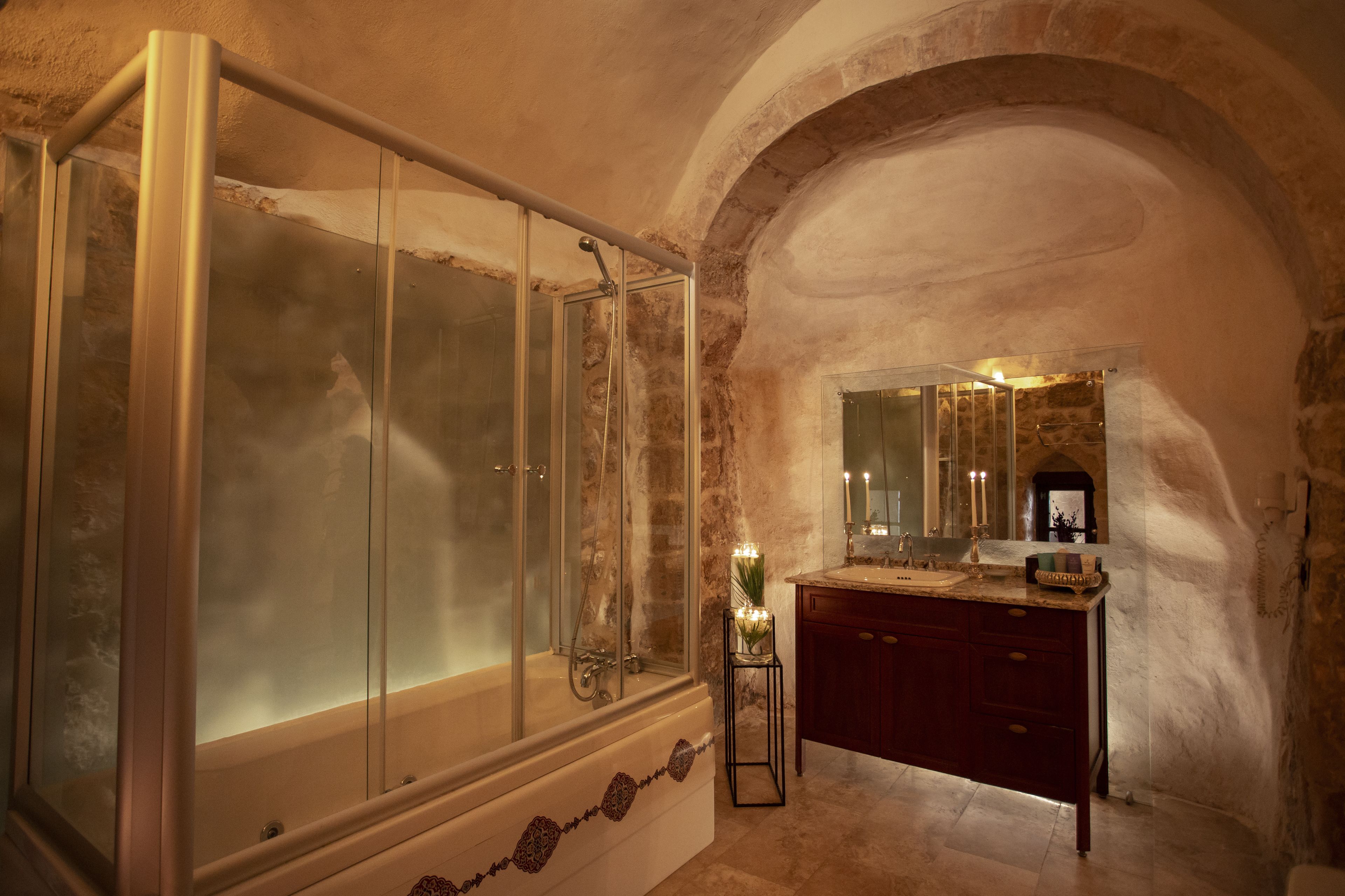 deluxe room | bathroom | designer toiletries, hair dryer, bathrobes, slippers