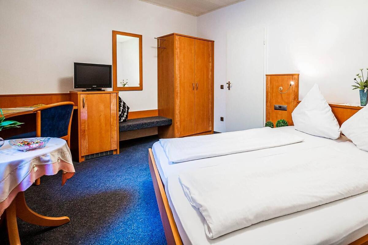 Desk, rollaway beds (surcharge), WiFi (free), bed sheets