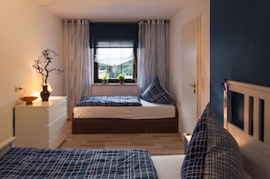 Suite, 1 Schlafzimmer | Schallisolierte Zimmer, kostenloses WLAN, Bettwäsche