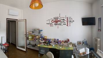 Family Room, Non Smoking, Private Bathroom (External) | Living area | 55-inch Smart TV with digital channels, TV, Netflix