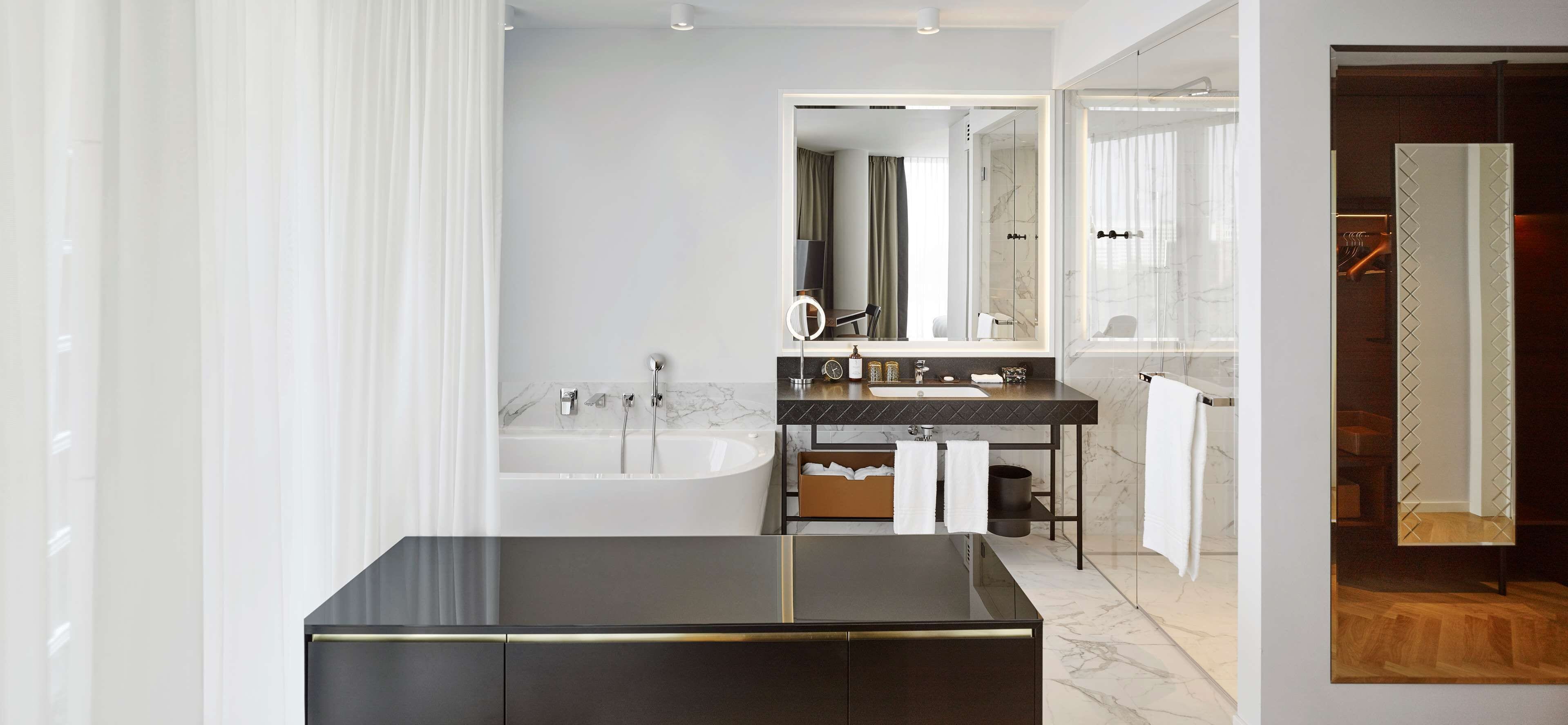 free toiletries, hair dryer, heated floors, towels