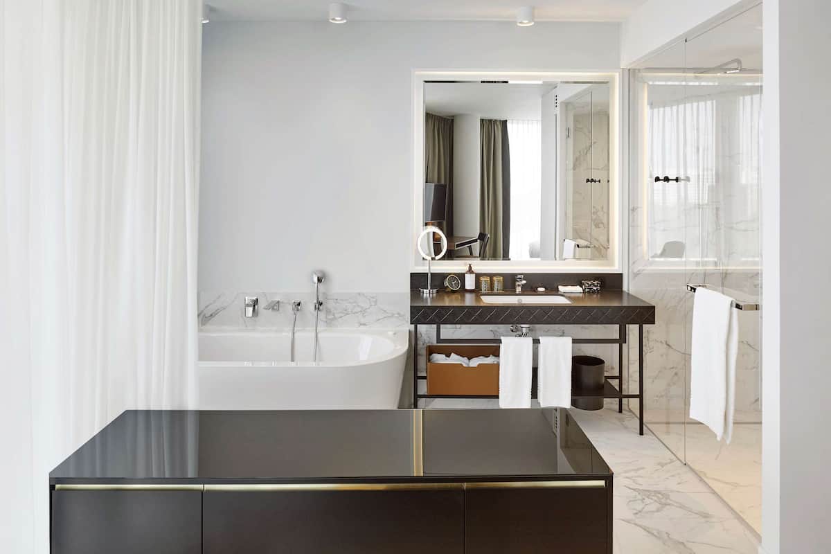 free toiletries, hair dryer, heated floors, towels