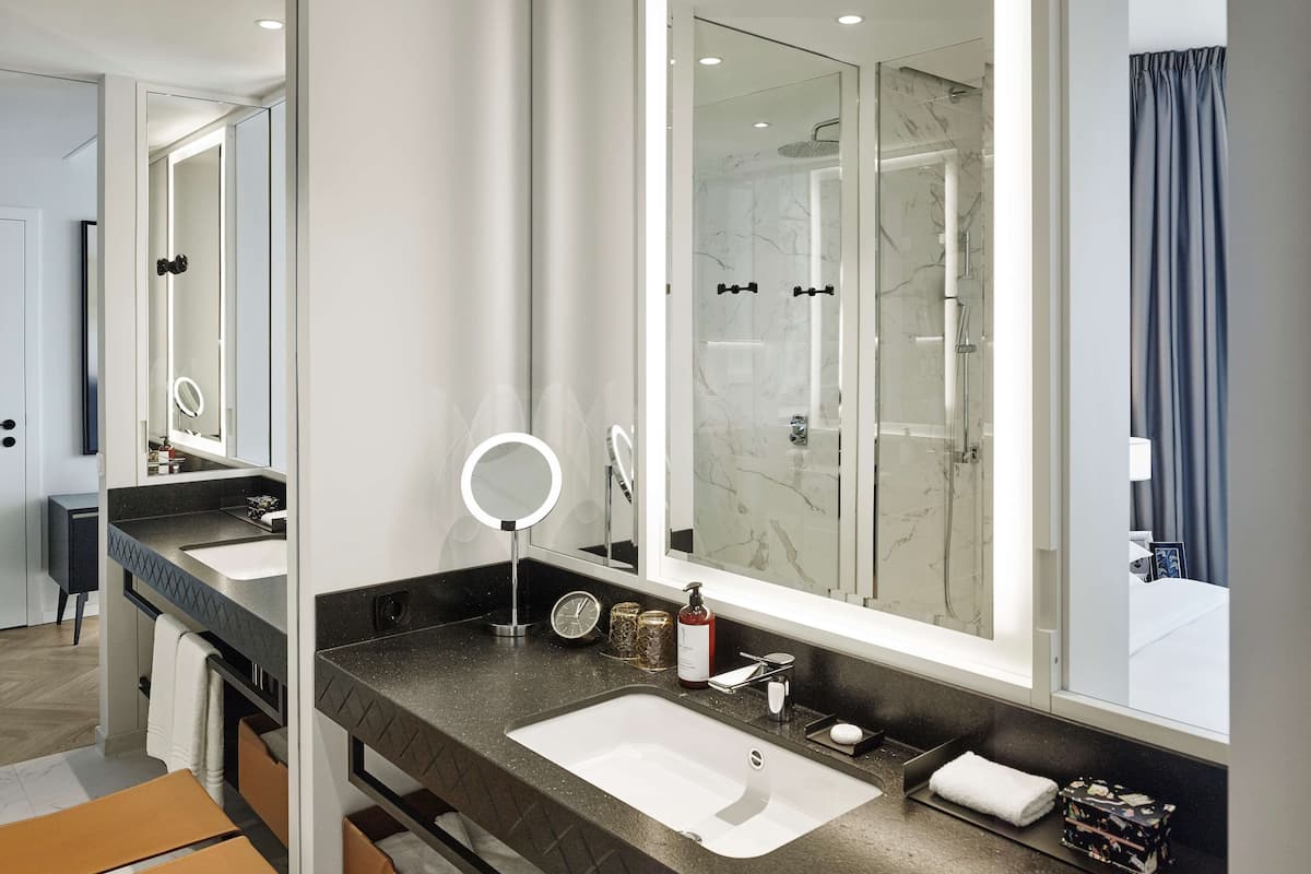 free toiletries, hair dryer, heated floors, towels