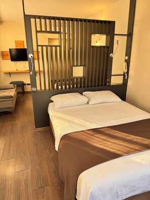 Suite estudio junior | Caja fuerte, wifi gratis, ropa de cama
