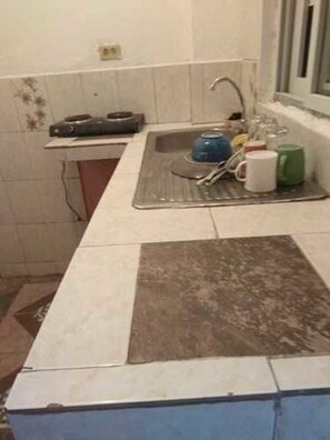 Fridge, stovetop, cookware/dishes/utensils