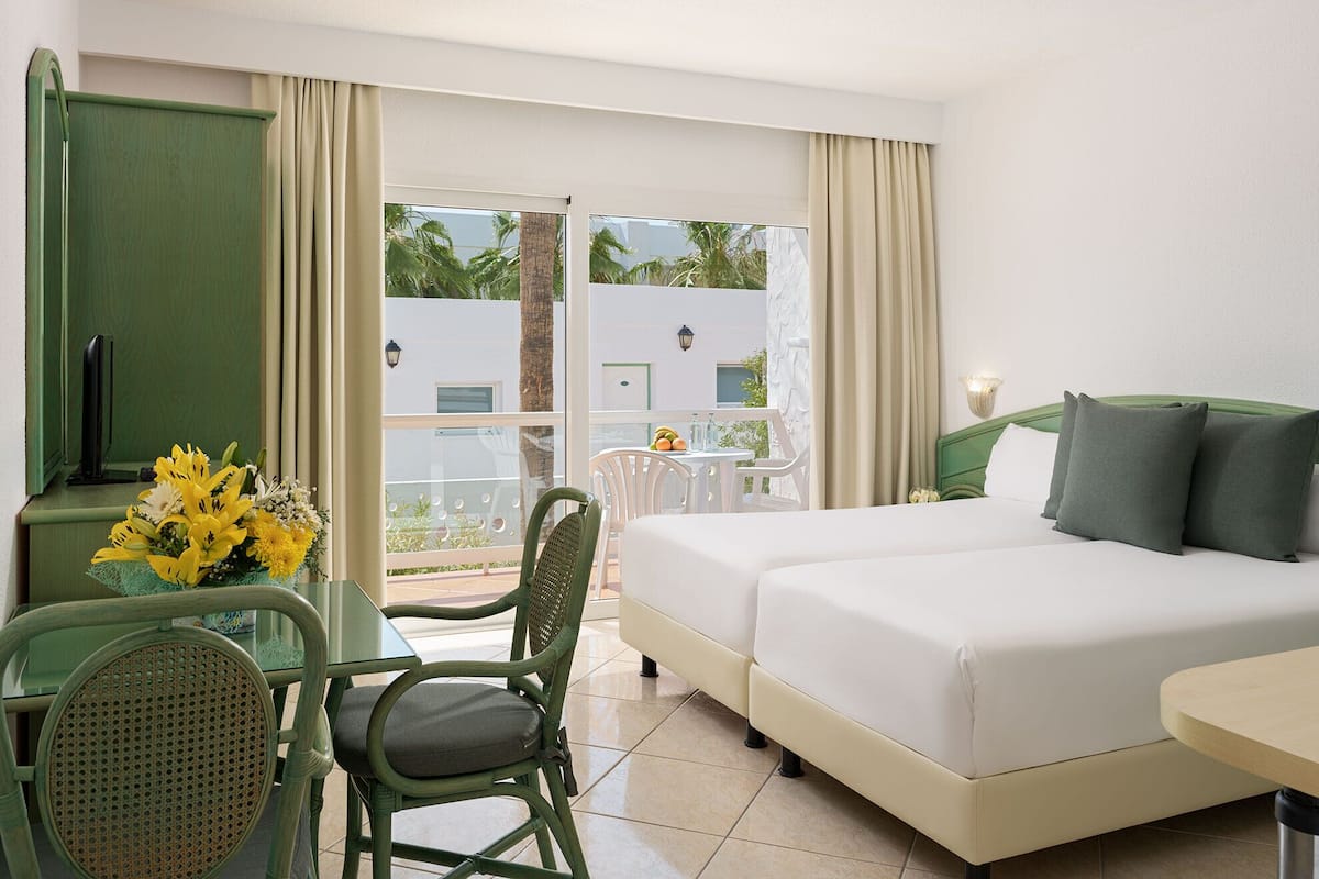 Studio, 2 Single Beds, Balcony | 1 bedroom, in-room safe, free WiFi, bed sheets