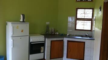 Fridge, microwave, stovetop, cookware/dishes/utensils