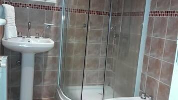 Shower, free toiletries, hair dryer, towels