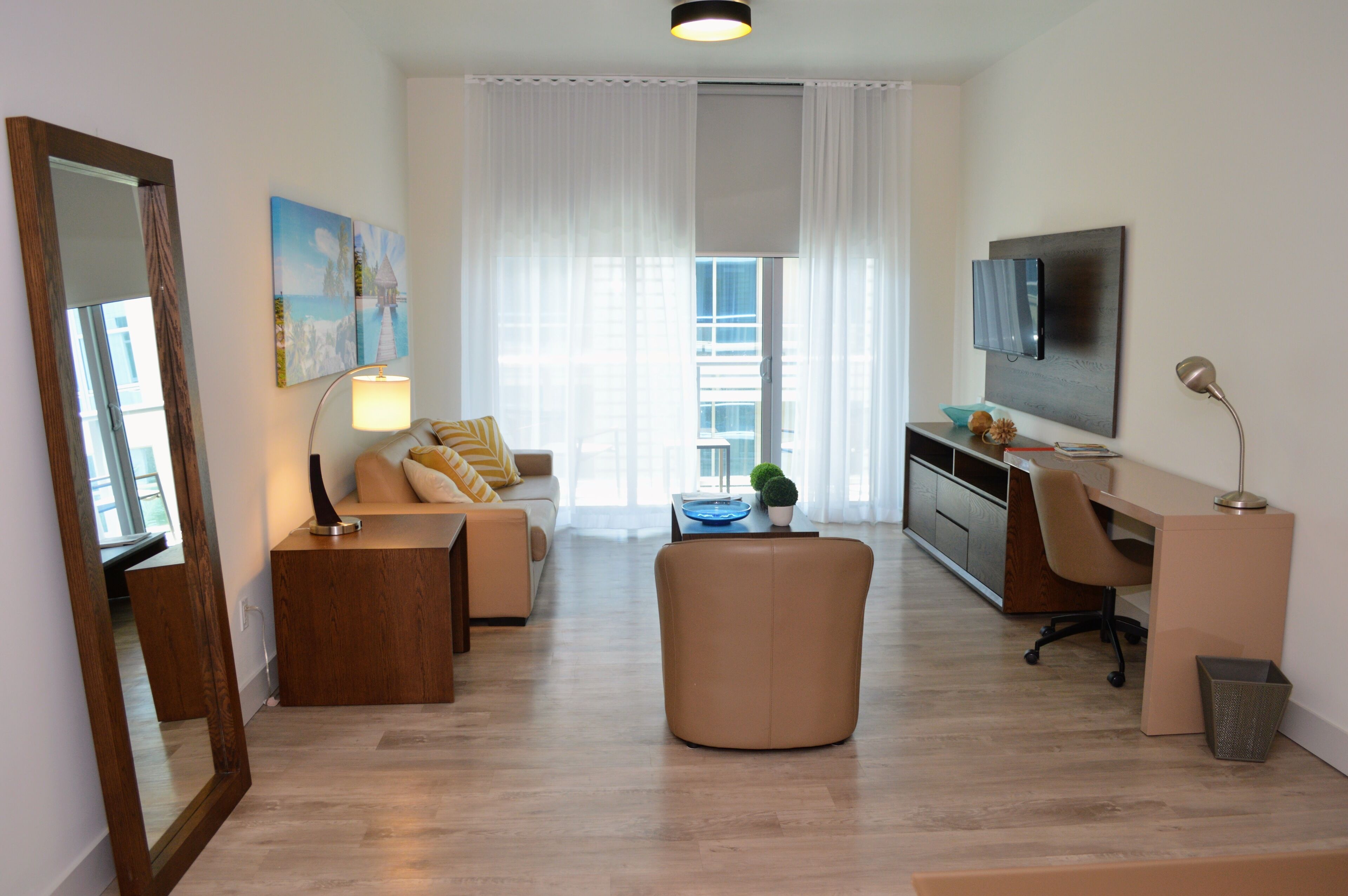 exclusive suite, 1 bedroom, partial sea view | living room | 31-inch flat-screen tv with cable channels, tv, netflix