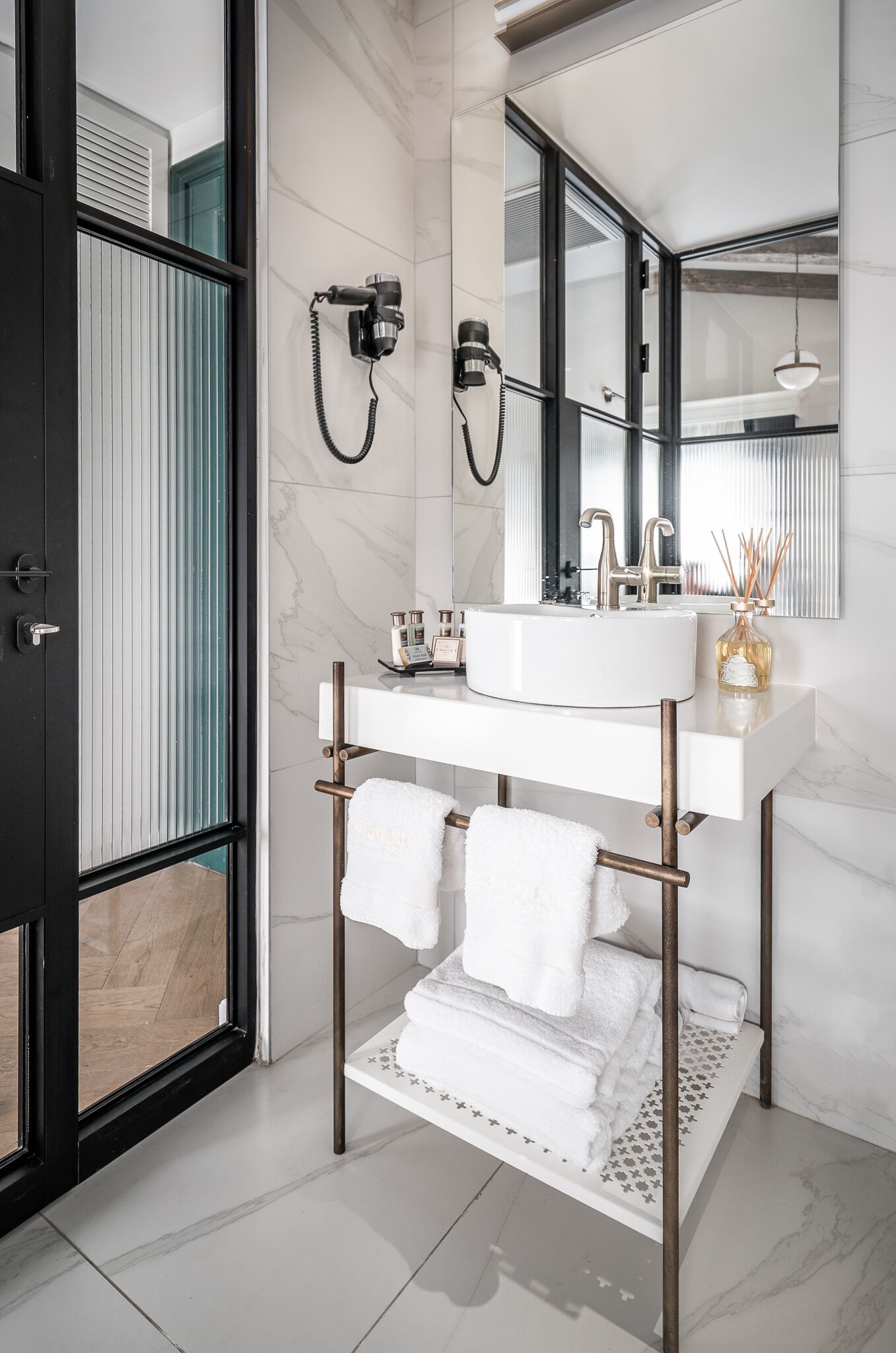 jetted bath, designer toiletries, hair dryer, bathrobes