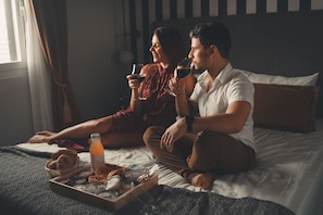 Family Room, Multiple Beds, City View | Breakfast meal | Free local cuisine breakfast on weekdays 