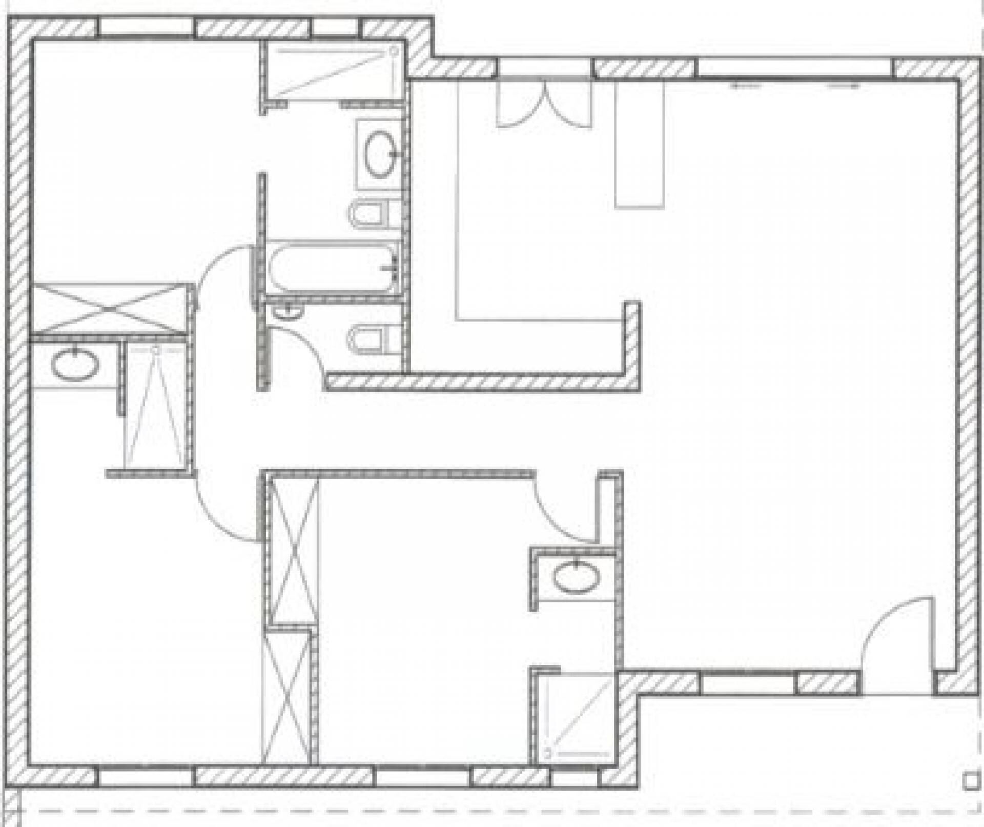 A floor plan with a kitchen, two bathrooms, and a dining area.