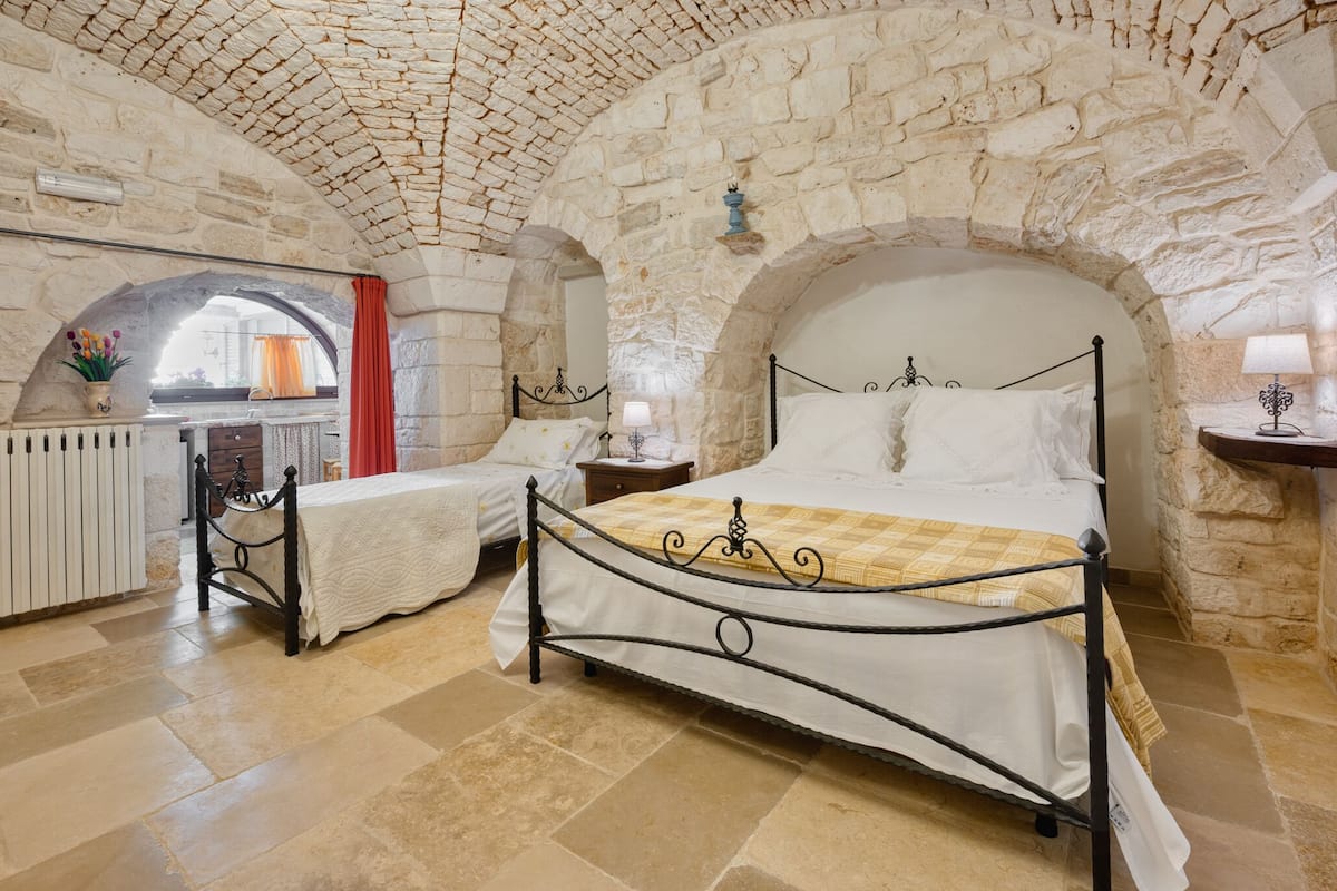 Junior Suite, Pool View (Trullo Verga) | 1 bedroom, in-room safe, blackout curtains, soundproofing