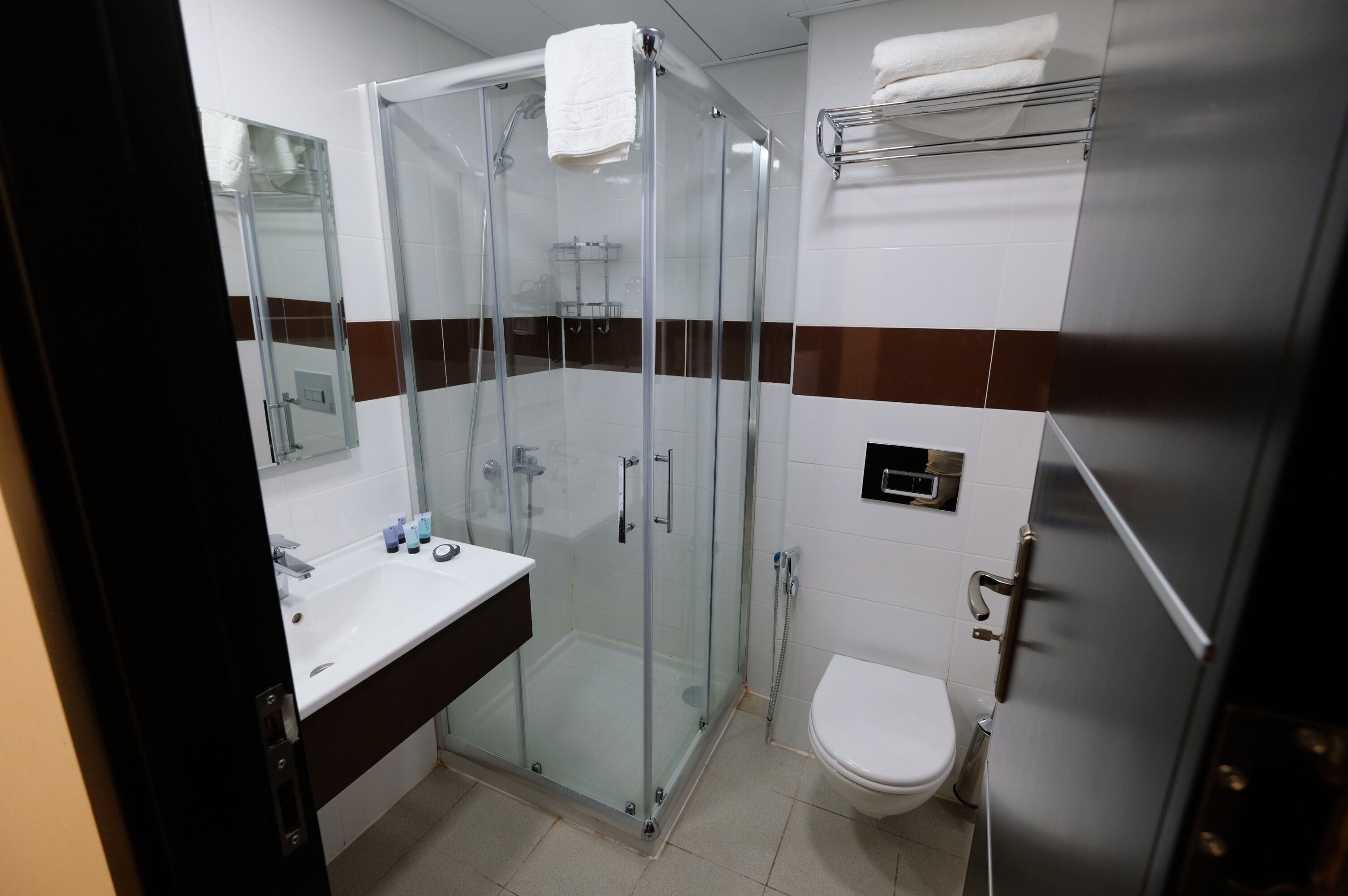 shower, free toiletries, hair dryer, towels