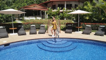 Outdoor pool, open 9:30 AM to 9:30 PM, pool umbrellas, sun loungers