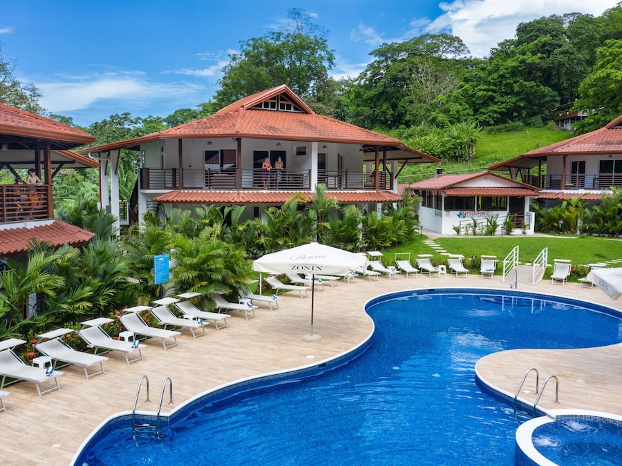 Outdoor pool, open 9:30 AM to 9:30 PM, pool umbrellas, sun loungers