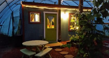 Cottage In A Greenhouse