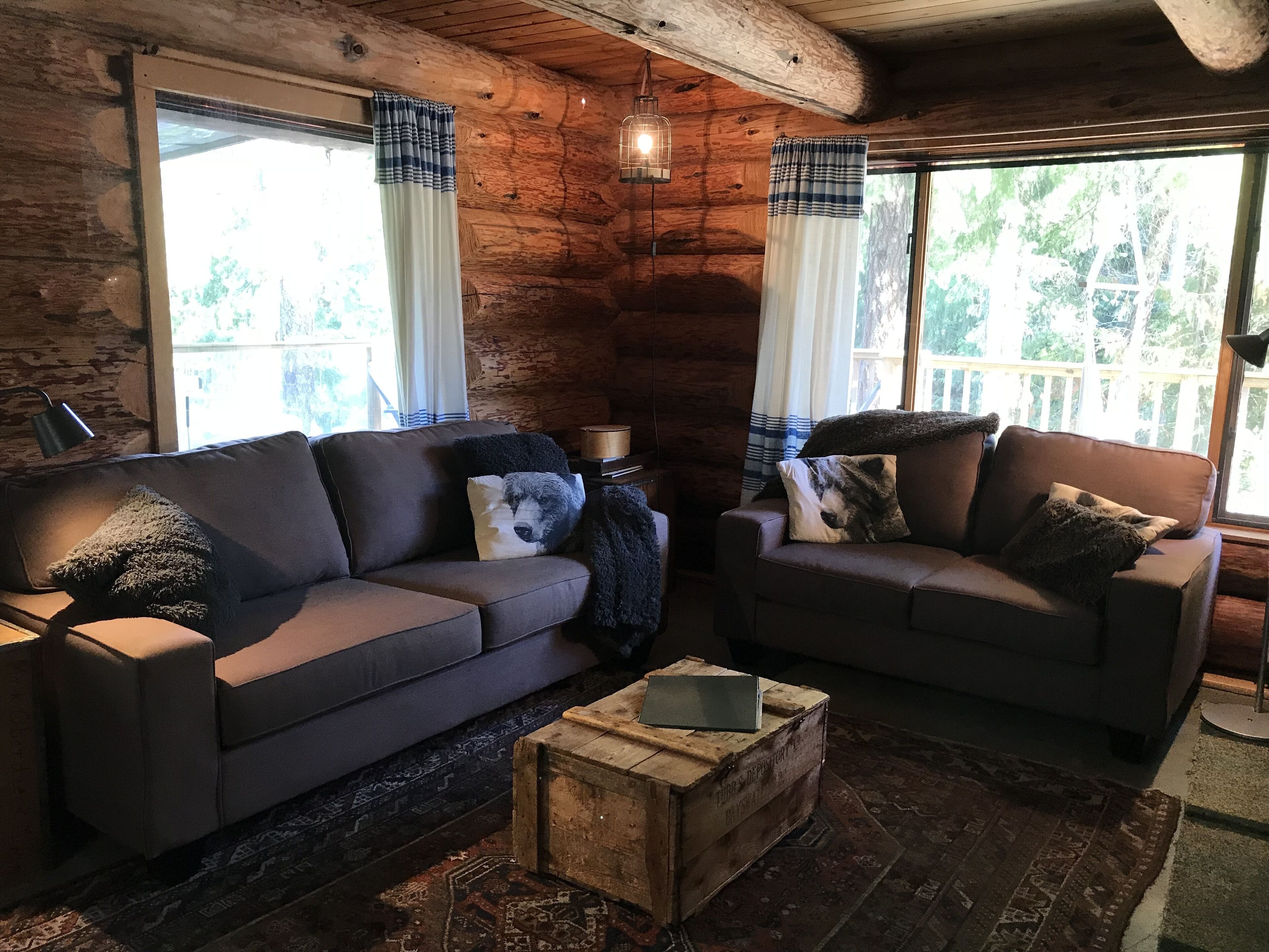 The Enchanted Woods Waterfront Log Cabin at Secret Cove