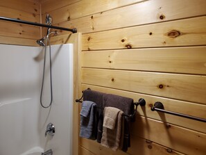 Combined shower/tub, hair dryer, towels, soap