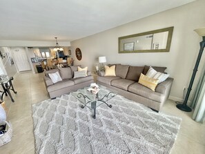 Flat-screen TV, DVD player, books