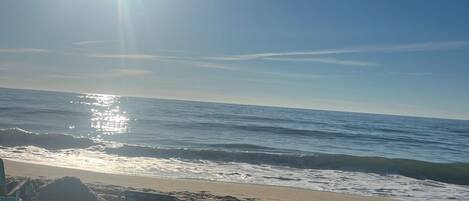 On the beach, sun loungers