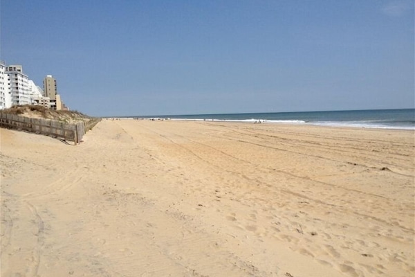 On the beach, sun loungers