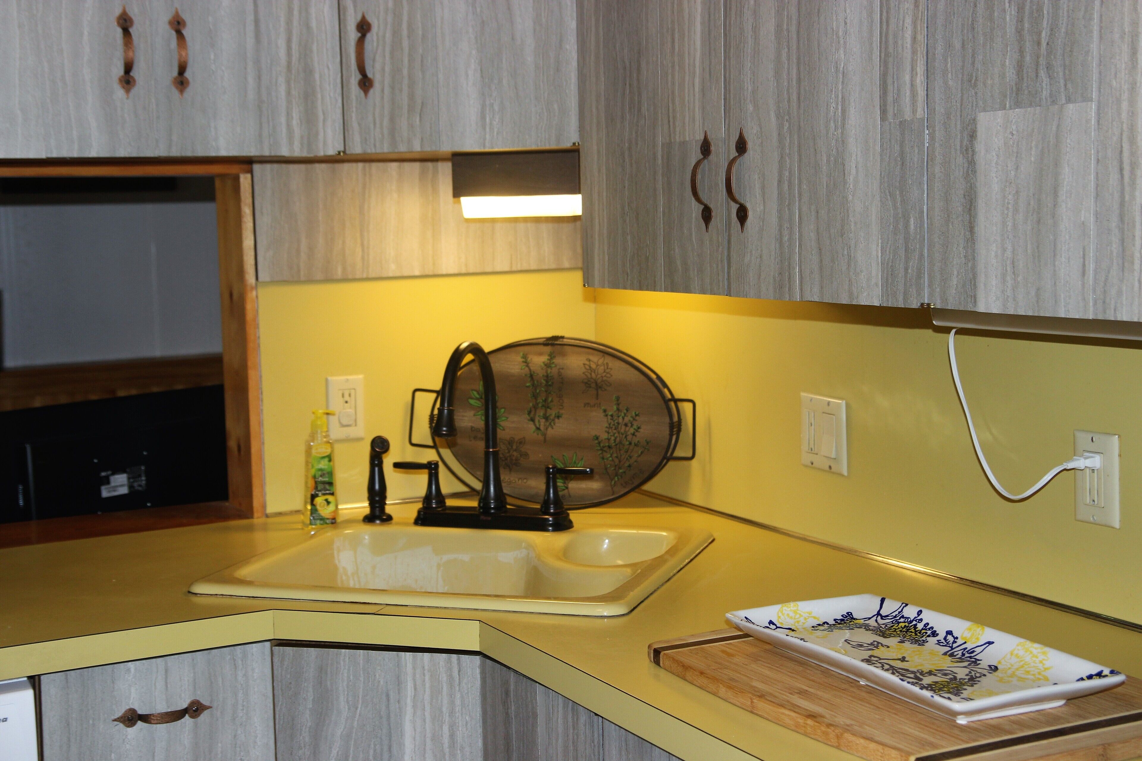 Enjoy the fall colors on this lakeside porch in Dunhams Bay.  