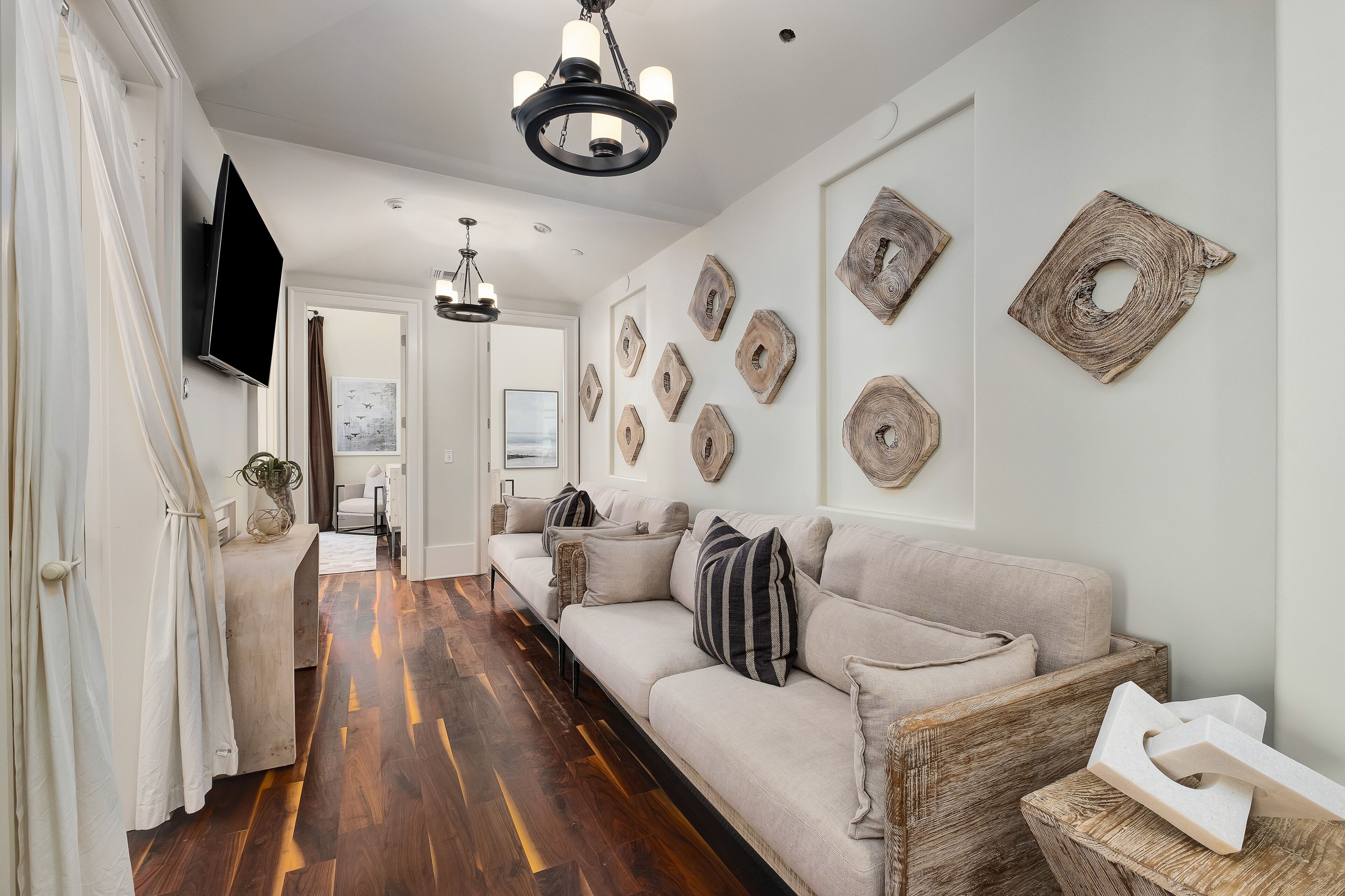 Hallway with counch seating, 55 inch samaung tv