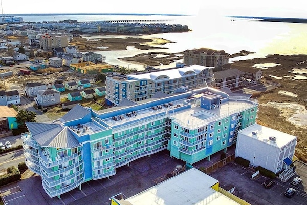 Arial view of condo building looking southwest showing the Assawoman Bay.