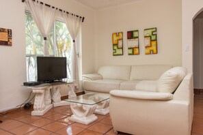 Superior Condo, 2 Bedrooms, Courtyard View, Courtyard Area | Living area | Flat-screen TV - Kaa Xel (Playa del Carmen)