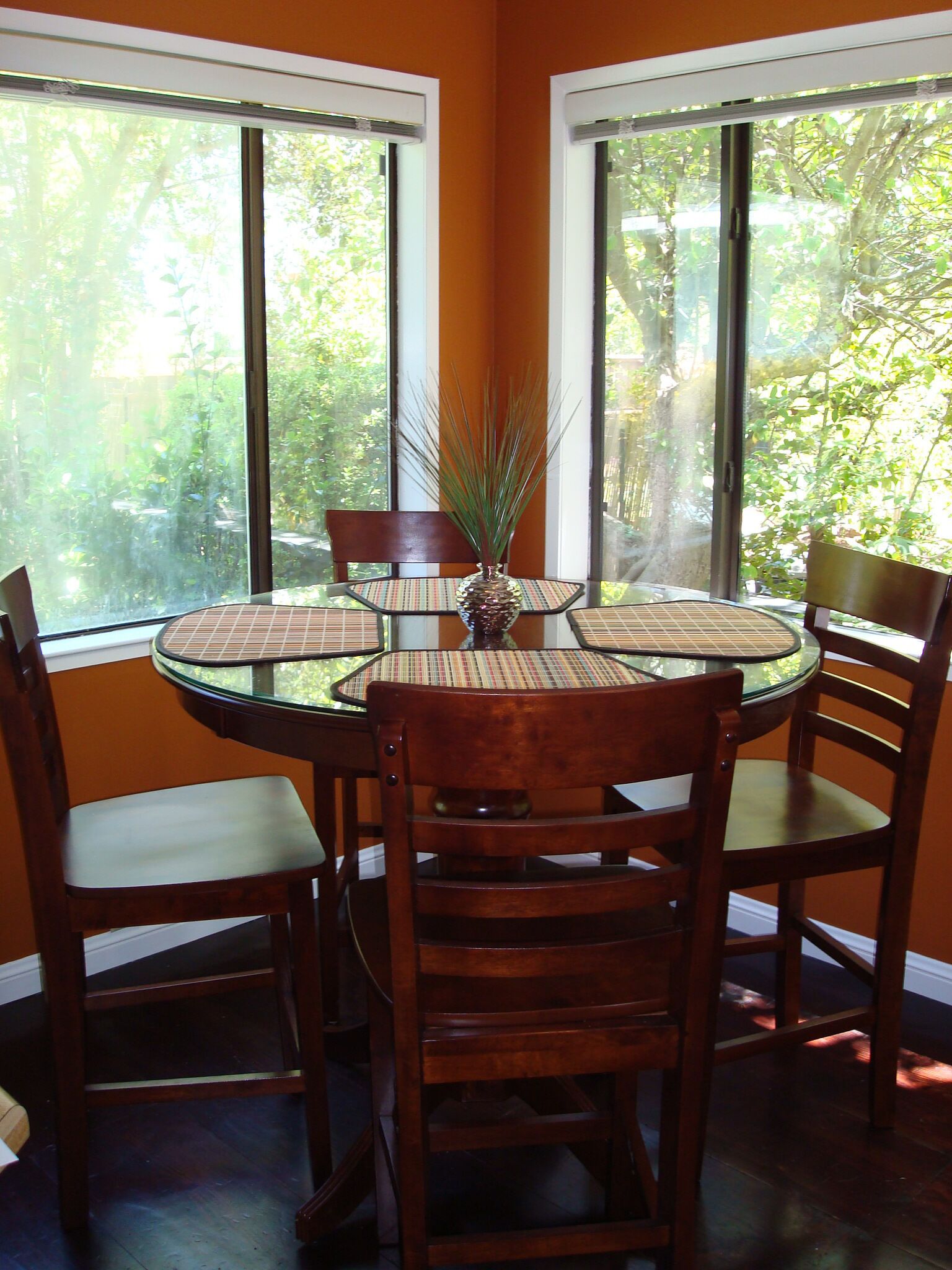 Breakfast nook adjacent to kitchen.  Extra chairs and high chair in garage.