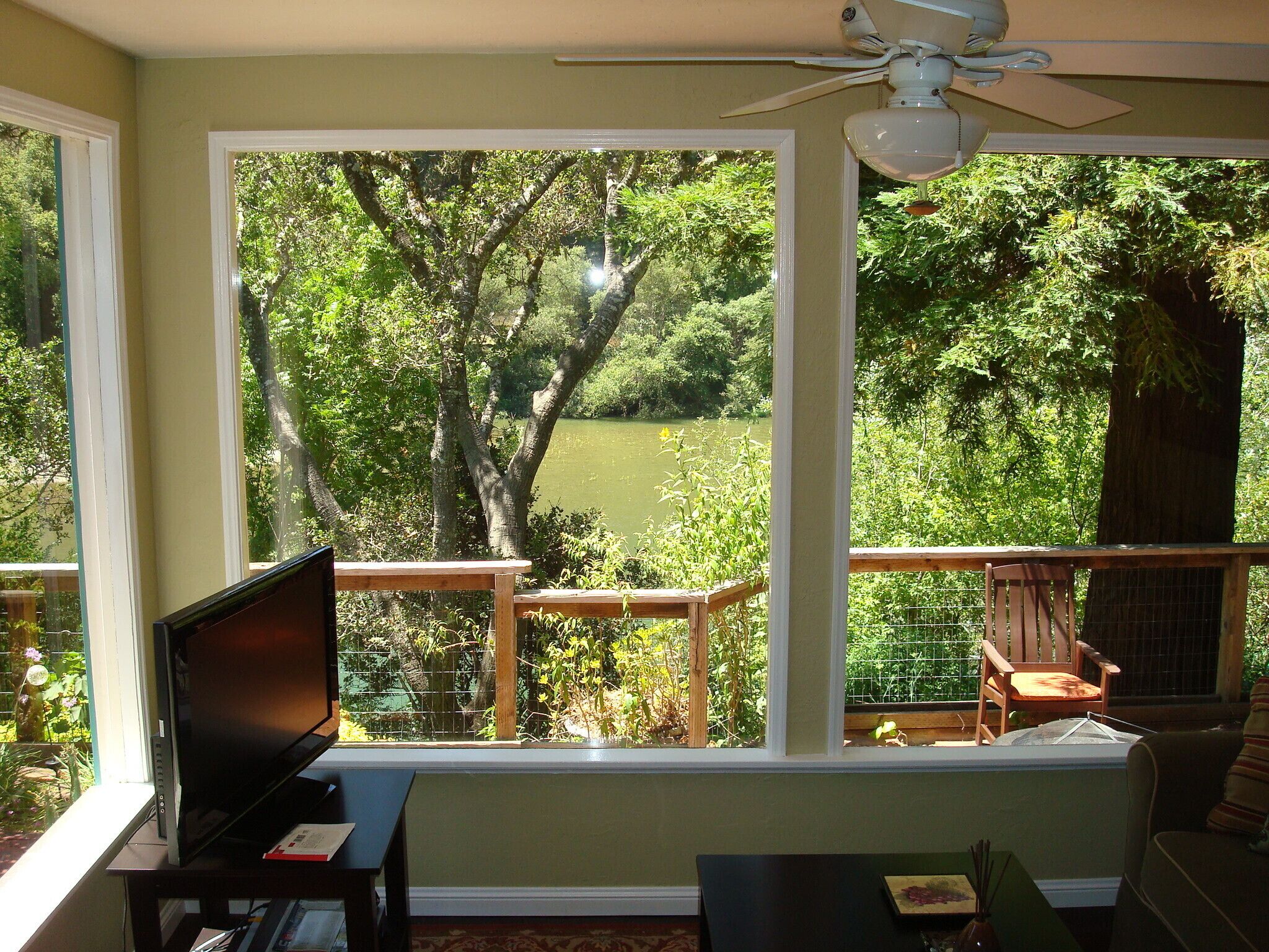 Floor-to-ceiling windows in living room lets in light and views!