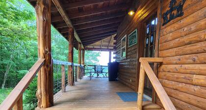 Deer Cabin Of Deer Lodge Cabin Rentals is a Secluded Ozark Cedar Log Cabin