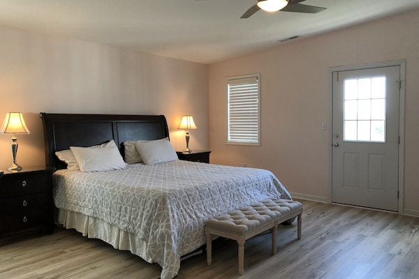 1st spacious & airy master bdrm with walk-in closet, full bathroom, and balcony