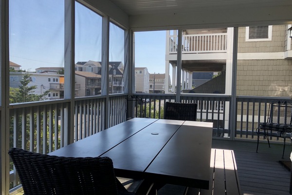 Screened-in porch off the living room.