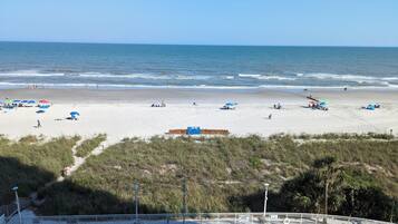 On the beach, sun loungers