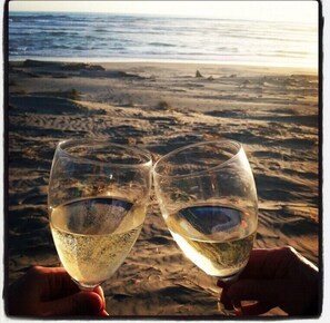 On the beach, sun-loungers, beach towels