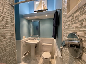 Combined shower/tub, hair dryer, towels, soap