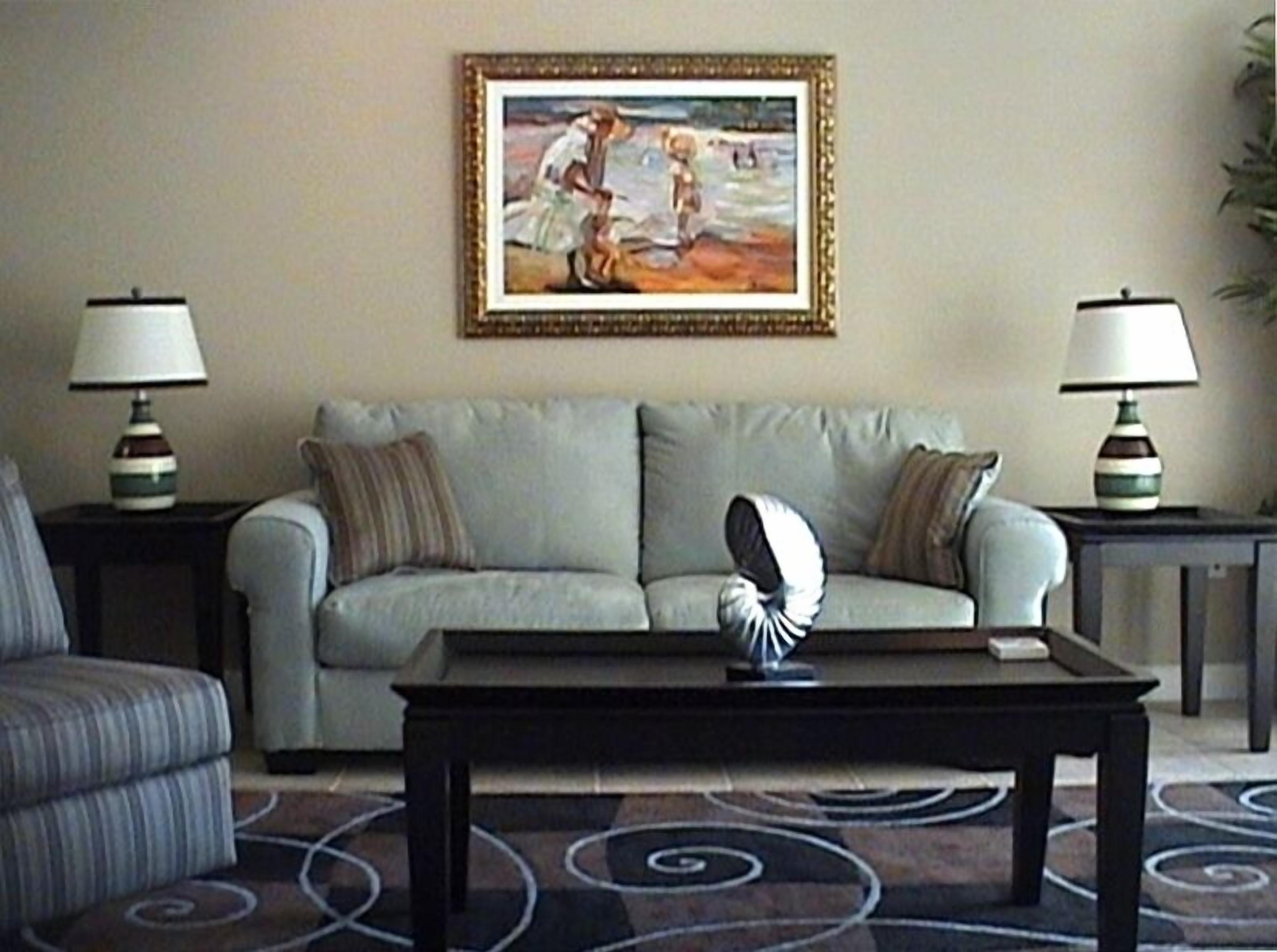 5th Floor C-Unit with designated parking space