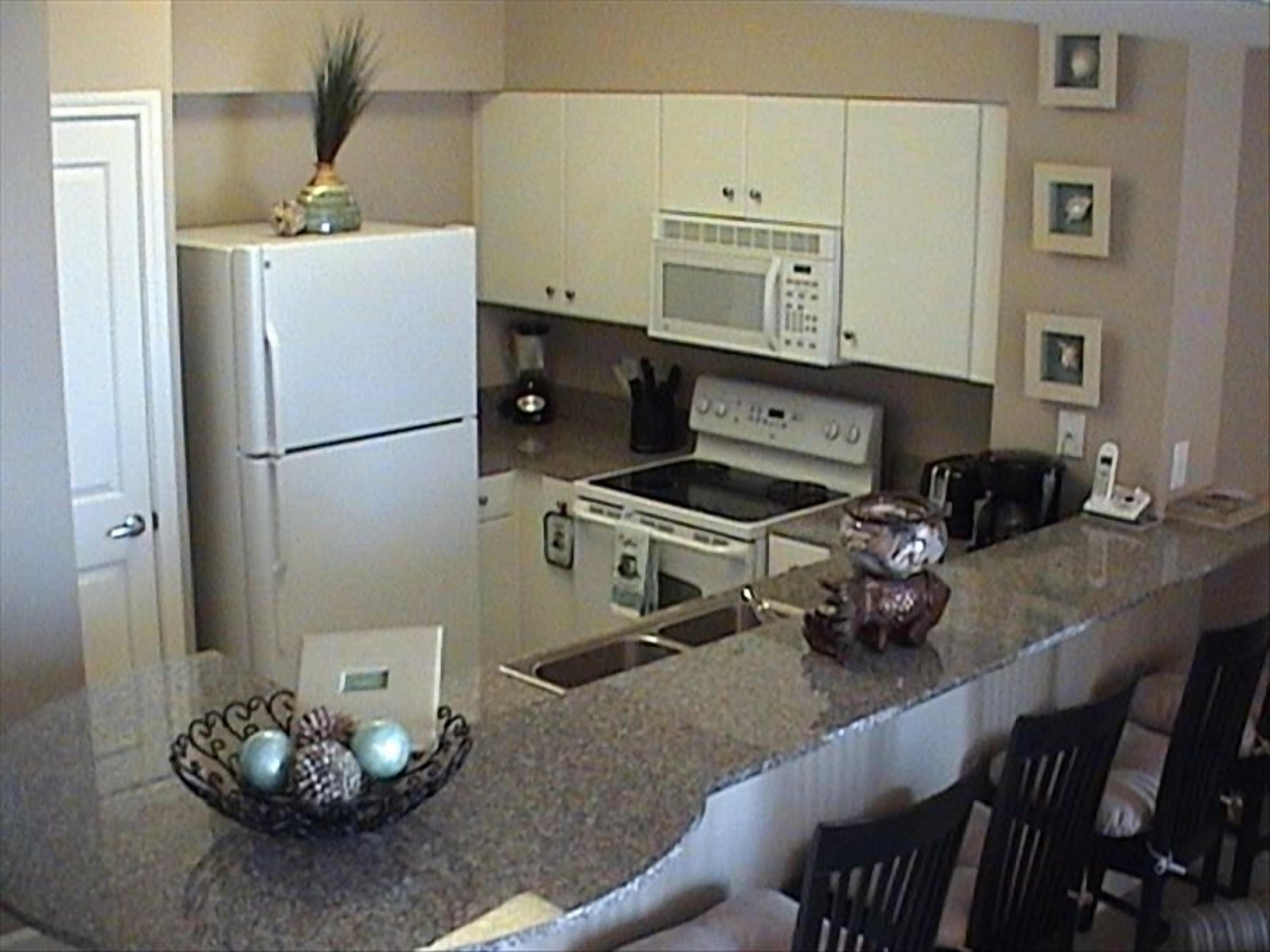 5th Floor C-Unit with designated parking space