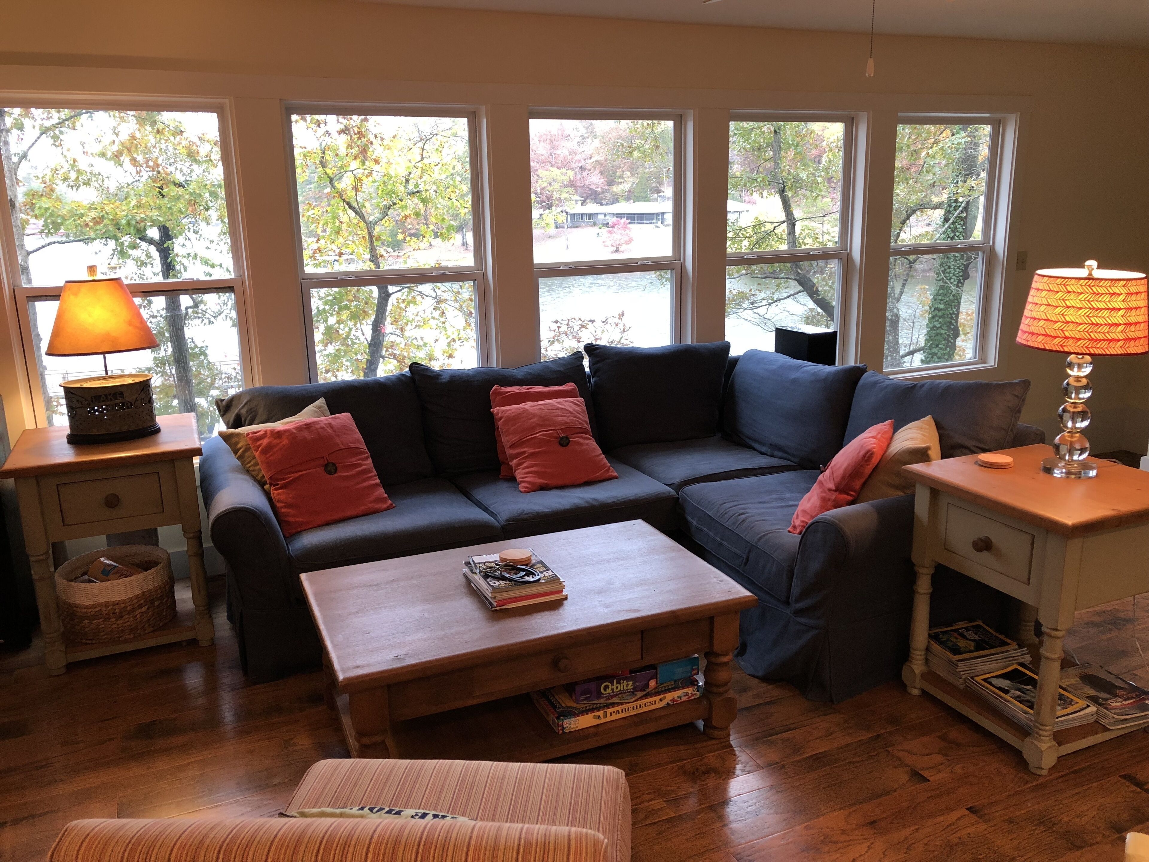 Cute cottage on Lake Lanier with dock and screened porch. 
