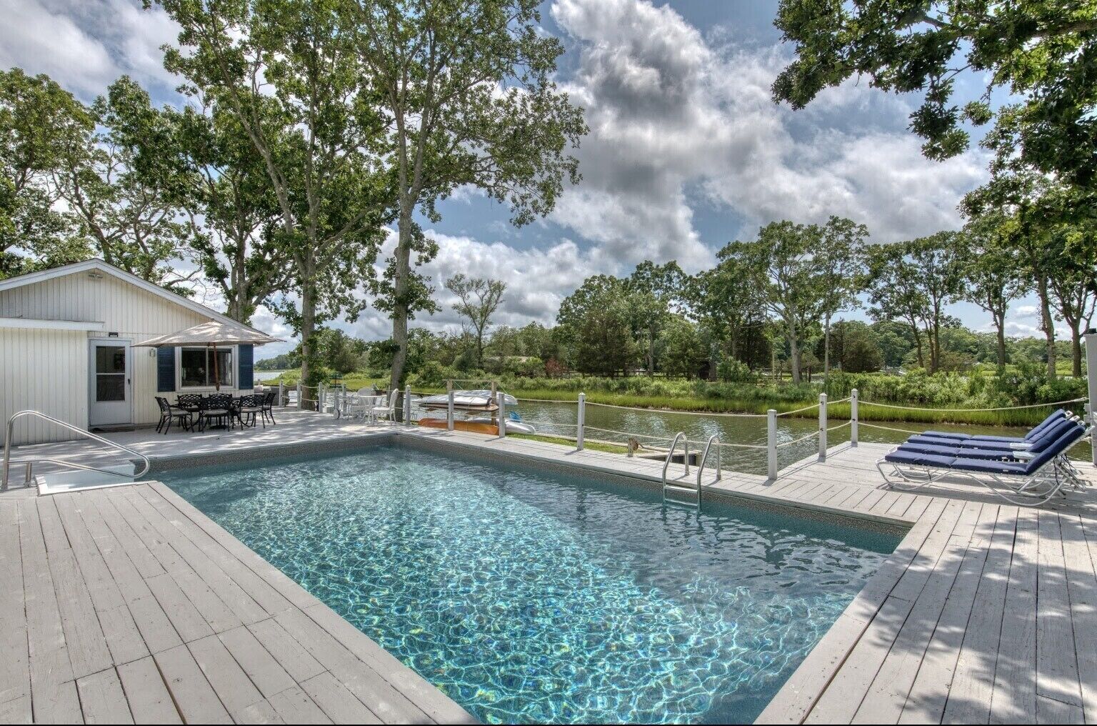 Beautifully appointed  waterfront property with heated pool and cabana