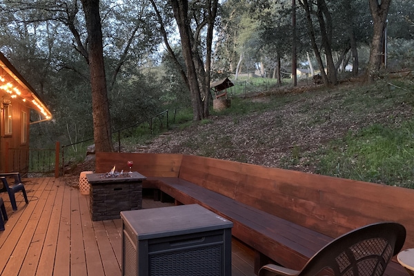 fire pit seating on the back deck off the kitchen