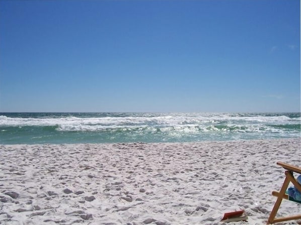On the beach, sun-loungers
